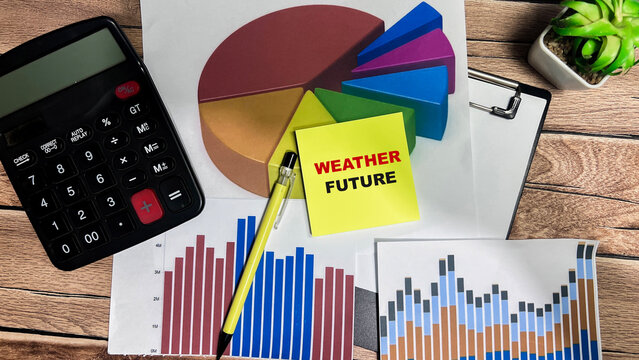 Concept of Weather Future write on sticky notes isolated on Wooden Table. - Powered by Adobe