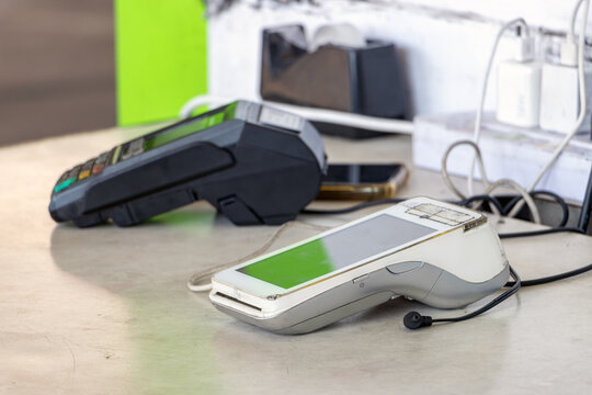 Mobile terminals on the table at the gas station