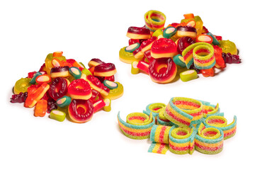 Assorted colorful gummy candies. Top view. Jelly donuts. Jelly bears. Isolated on a white background.