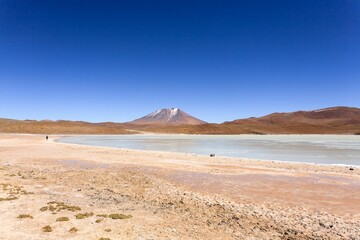 Desert landscape with mountain and salt flat