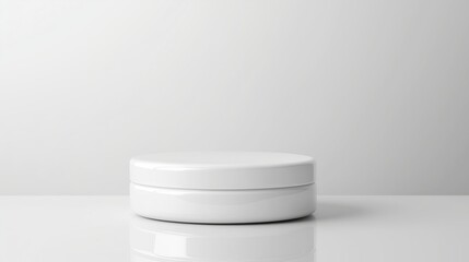 Minimalist white product platform with clean reflections for versatile design