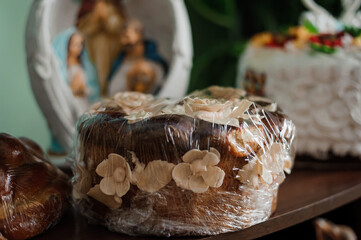Decorative Cake Wrapped for Preservation on a Wooden Shelf