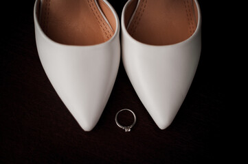 Elegant Bridal Shoes and Engagement Ring Composition