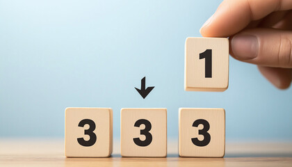 Prioritization Strategy Hand Places Number One Above Three Wooden Cubes