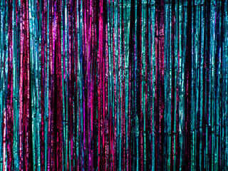 long curtain glitter bright tinsel background, multicolored