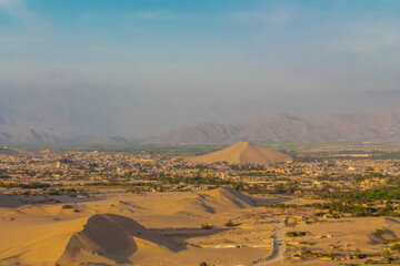 Huacachina oasis among the sand dunes dry desert in Peru. Peruvian natural wonder in the desert...