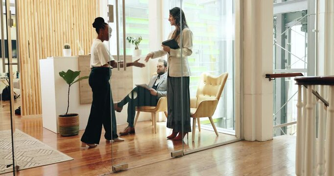 Shaking hands, business women and meeting for interview, introduction or welcome to office lobby in waiting room. Handshake, hr and greeting for hiring, recruitment offer or collaboration opportunity