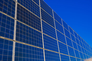 Solar Panel Installation Under Blue Sky.Renewable clean energy from sunlight.solar power...