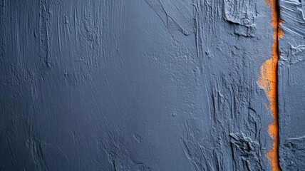 Obraz premium Abstract textured blue surface with orange streak