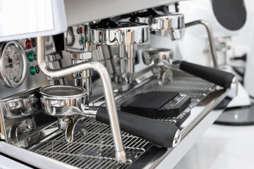 Coffee machine prepare making coffee menu in the cafe.Professional bronze coffee machine stands on a desk in a cafeteria.