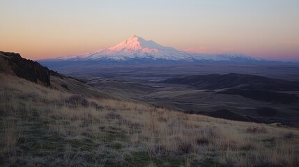 Fototapeta premium Majestic Mountain Landscape at Sunrise with Soft Pastel Colors