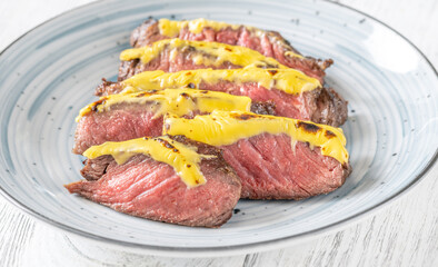 Cheese topped beef steak