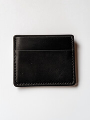Fototapeta premium Pristine Elegance: Jet-Black Minimalist Wallet on a Crisp Background