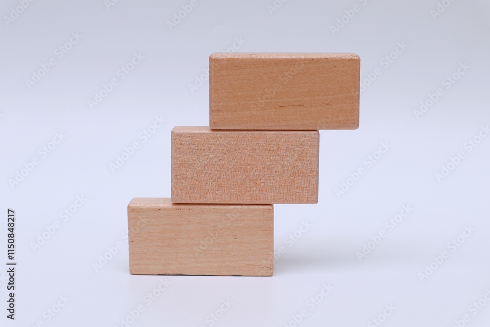 Fototapete stack of empty wooden blocks for written text on white background