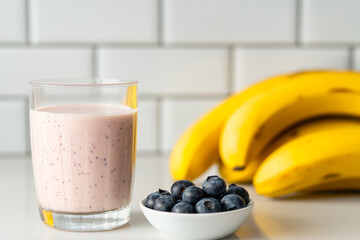 Healthy Smoothie with Bananas and Blueberries on Counter