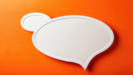 Minimalistic speech bubble icon on orange background