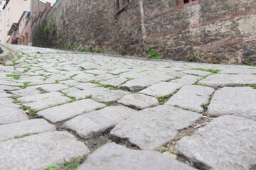 Textured Cobbled Streets that Effortlessly Showcase a Worn and Distinctive Aesthetic Appeal