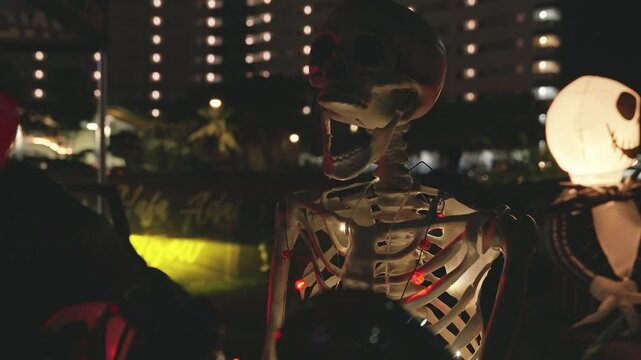 Half body shot of a halloween skeleton decorated outdoors