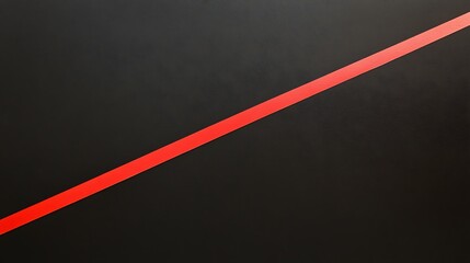 Diagonal red line on black background.