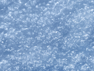 Background of winter snow texture. Small ice crystals on surface of snow natural background