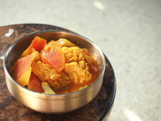 Thai sour curry with papaya and fish