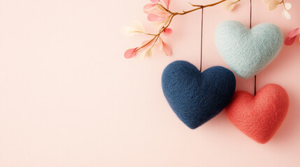 Love concept image with 3 wool handmade craft hearts for sustainable living lifestyle on valentine's day