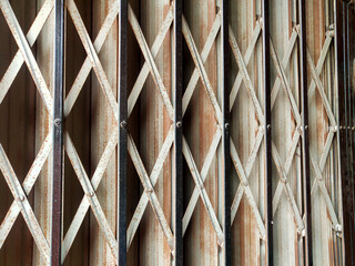 Background of the reinforcement of the folding gate which has started to rust