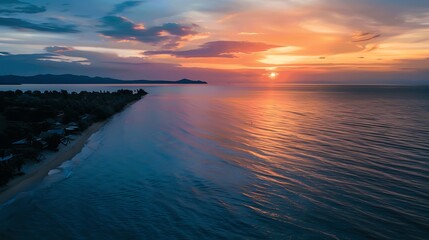 Sunset Over Tranquil Ocean Waves at Dusk