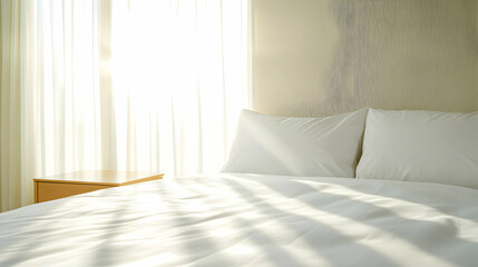 Cozy bedroom with soft sunlight streaming in.