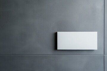 Obraz premium White placard on stainless frame with grey wall background. Free space on the right for designer. 