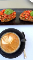 Bruschetta crafted with fresh produce and served with coffee honors Italy's historic culinary roots and celebrates Mediterranean sustainability. Authentic bruschetta coffee pairing.