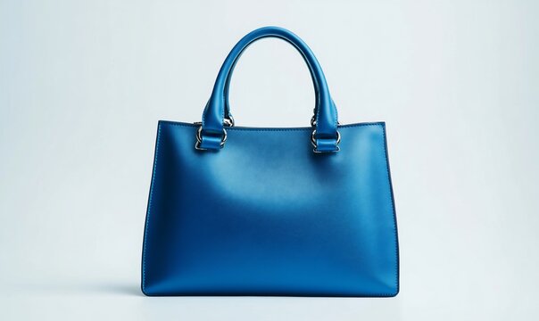 A sleek blue handbag displayed against a light background.