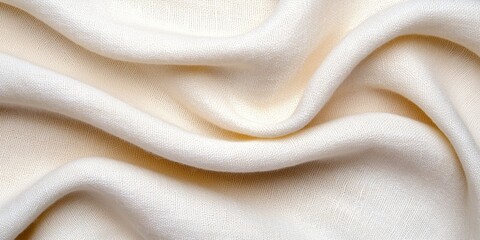 Obraz premium mindful living awareness concept. A close-up of soft, creamy fabric displaying gentle folds and textures, highlighting its smoothness and lightweight nature.