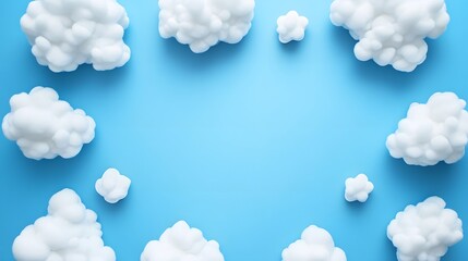 Fluffy white clouds against a blue sky background