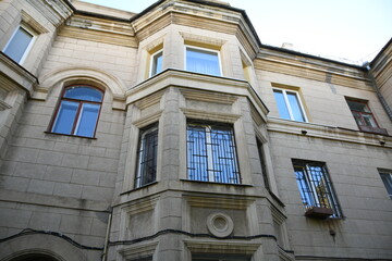 Obraz premium Architecture of old Soviet Union houses in Stalin's Empire style. Exterior of the facade of a vintage residential building in Russia