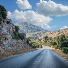 Fototapeta premium Empty road winding through mountains, Greece
