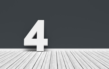 Number four leaning on dark gray wall in white room