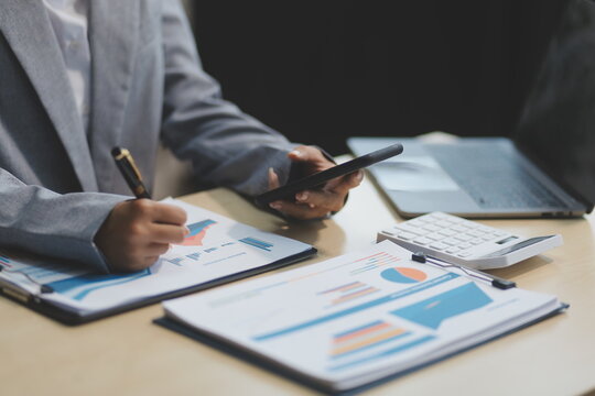 Business Documents, Auditor businesswoman checking searching document legal prepare paperwork or report for analysis TAX time,accountant Documents data contract partner deal in workplace office