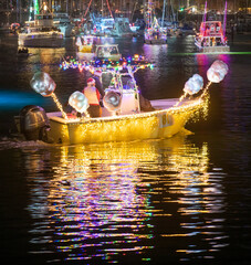 Christmas parade boat decorated with lights 