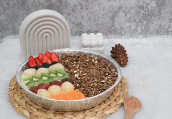 Fruit pudding combination. layered pudding with various fruit on top, and chocolate. it's a beautiful pudding with beautiful colors from the fruit