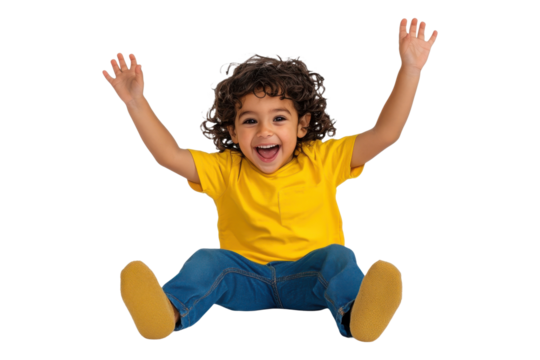 Excited child in a yellow shirt with arms raised isolated on a transparent background