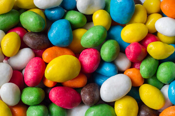 Lots of colorful candies. Bright sweet candies. Round dragee candies.