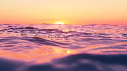 Obraz premium Tranquil sunset over the ocean showcases a breathtaking blend of orange and pink tones reflecting on the water, with soft waves gently caressing the shore.