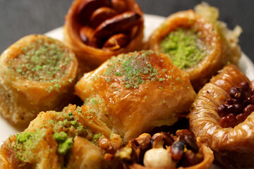 Delicious assortment of traditional sweets displayed on a plate showcasing different textures and colors
