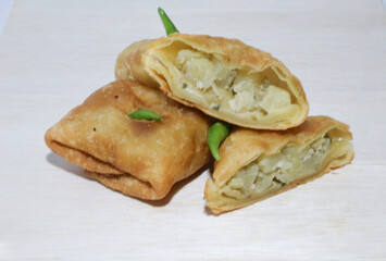 Martabak is a popular Indonesian street food. Martabak are fried pancakes or crepes and are usually filled with beaten eggs, chopped spring onions, carrots, potatoes and minced meat.