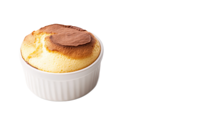 Delicious Chocolate Soufflé Rising in a White Ceramic Dish