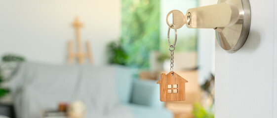 Moving house, relocation. The key was inserted into the door of the new house, inside the room was...