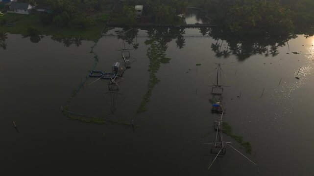 Chinese fishing nets or cheena vala are a type of stationary lift net,Lake in Kumbalangi, Chellanam, Ernakulam, God's own country, Kerala tourist places