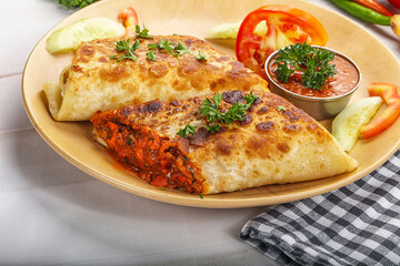 Mexican cuisine - chicken burrito with beans