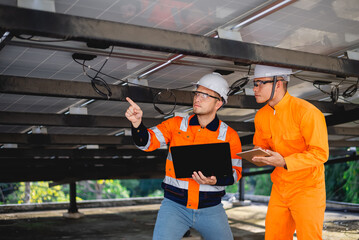 Electrical engineers are rigorously checking the circuitry and integrity of solar panel...
